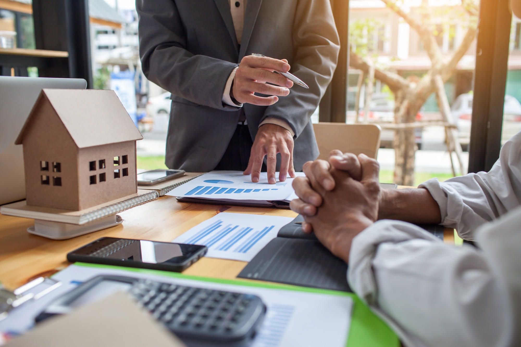Planning and negotiating for buying real estate in San Diego with a low-cost realtor, assisted by our experienced agents at One Percent Realtor Fees.